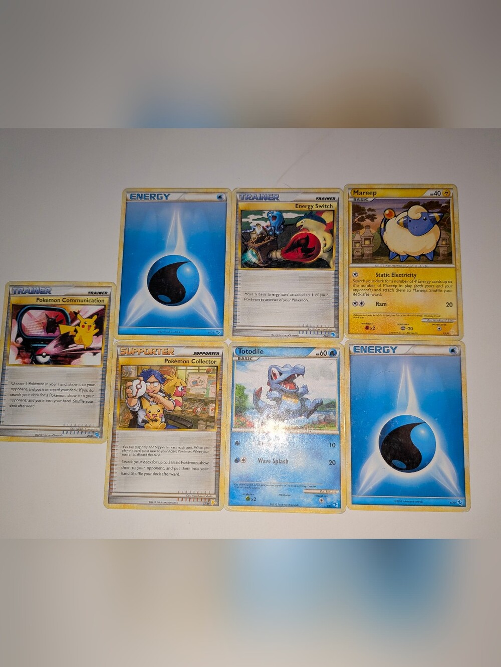 (2010) — (HEAVILY PLAYED) 7 Pokemon Cards, HeartGold SoulSilvers Raichu/Gyarados